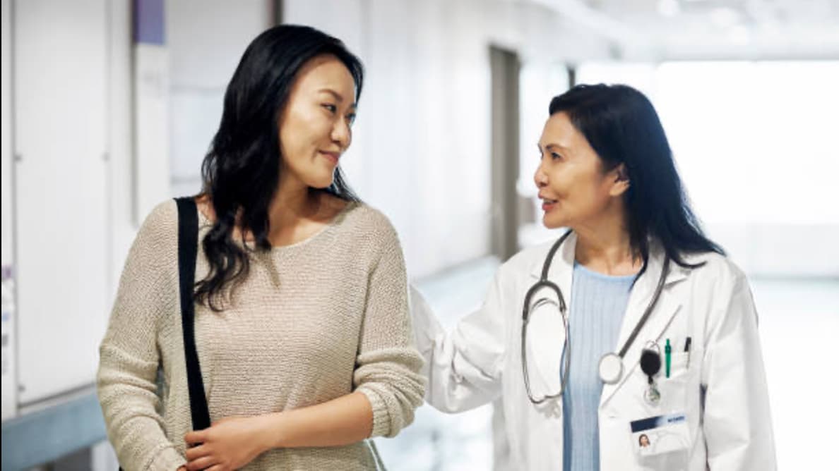 doctor talking with patient