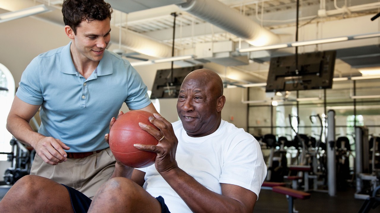 occupational therapist helping a patient