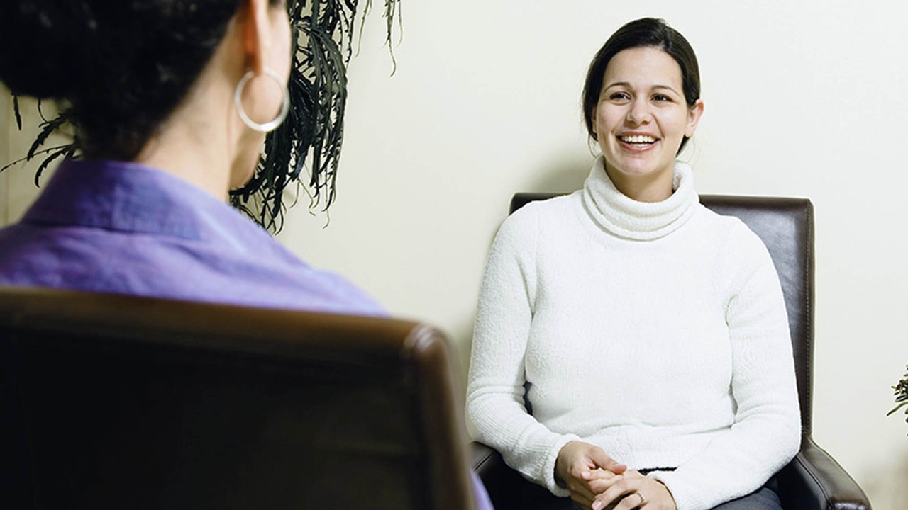 woman talking to a psychologist