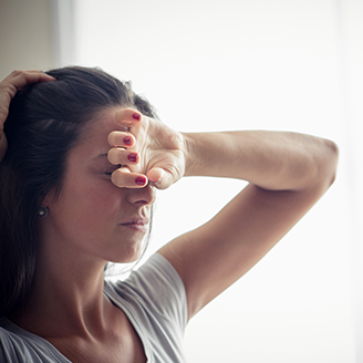 Woman with head pain 